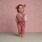 Cozy in Pink: Hand-Knit Bonnet & Romper Baby Doll