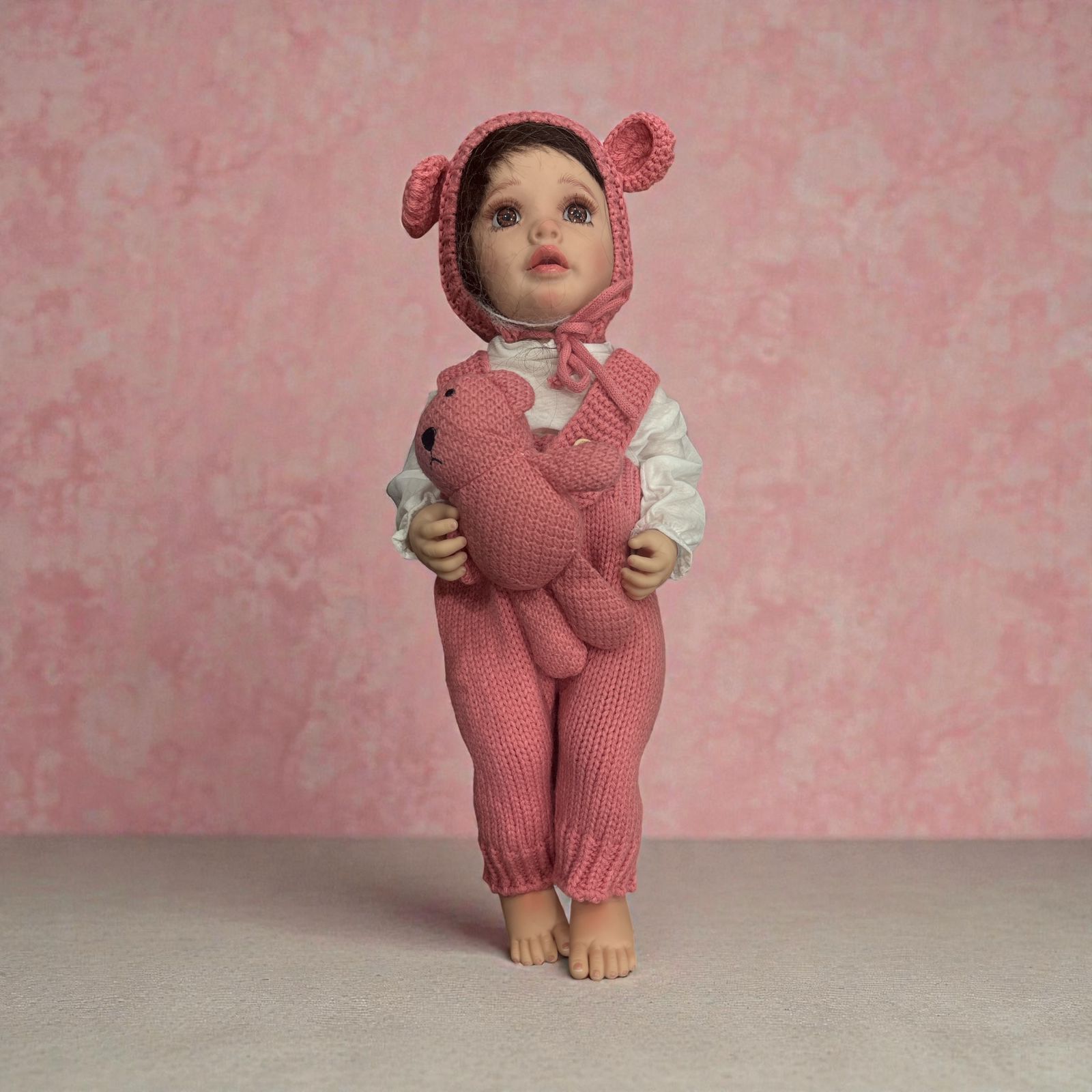 Cozy in Pink: Hand-Knit Bonnet & Romper Baby Doll