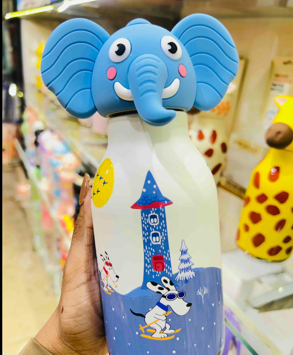 Insulated steel water bottle with 3D elephant silicone cap
