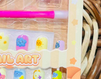 Close-up of press-on nail designs and packaging