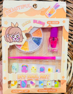Nail art kit in peach packaging with cloud and star print press-on nails