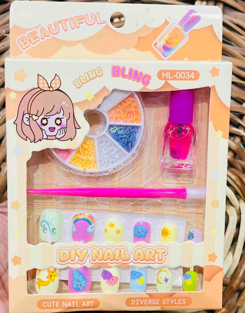 Nail art kit in peach packaging with cloud and star print press-on nails