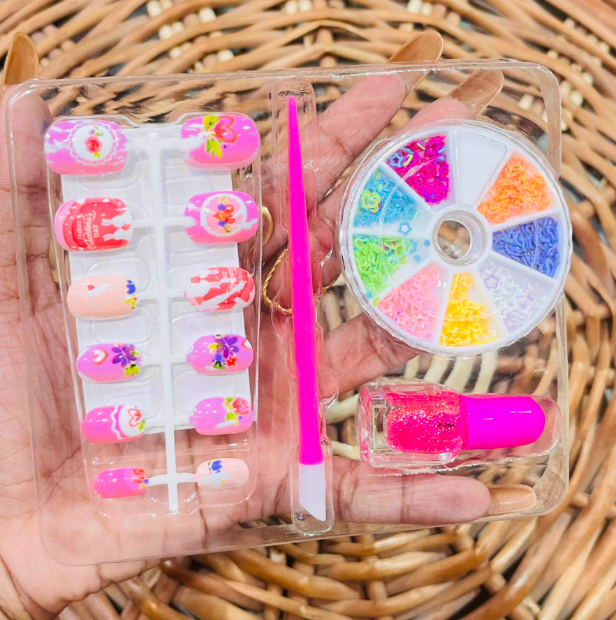 Nail art kit contents - press-on nails, applicator stick, confetti wheel, and glitter polish