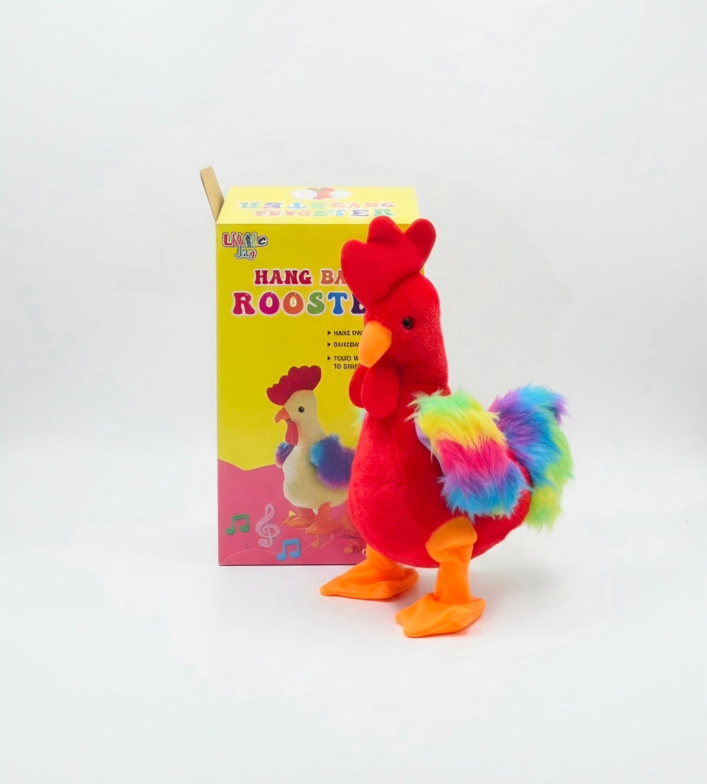 Electric plush rooster toy with rainbow tail beside its box