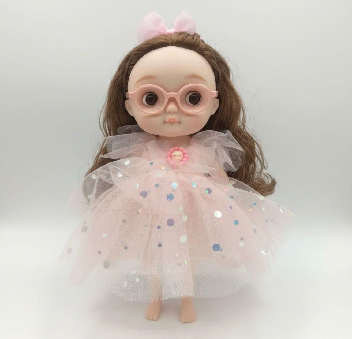 Collectible doll with glasses
