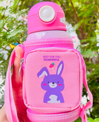 Pink carry pouch with bunny print and adjustable strap on bottle