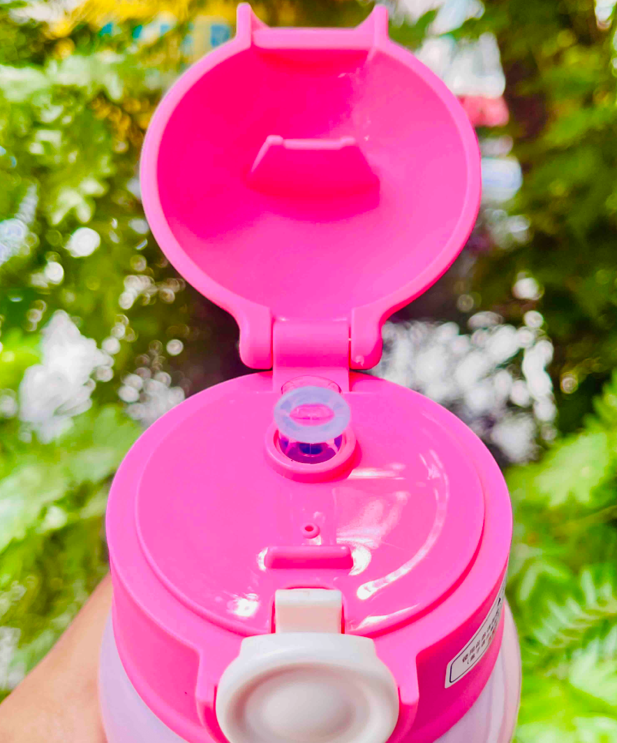 Close-up of flip-top pop-up spout lid